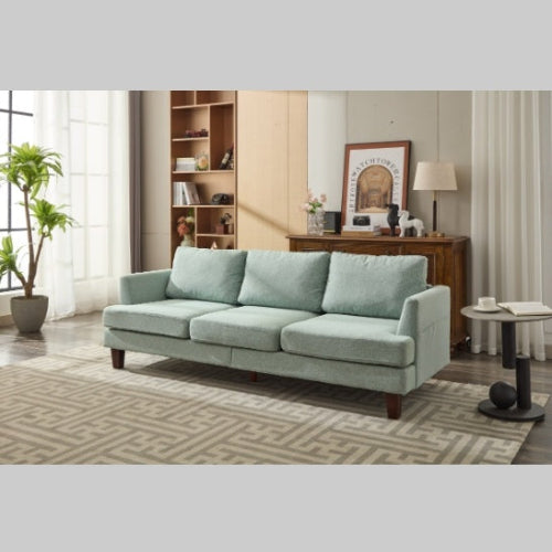 Light green 3-seater fabric sofa with USB ports in a cozy living room