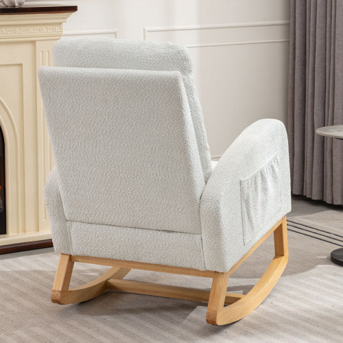 Elegant white rocking chair with footrest, high back support, and cushioned seat. Ideal for nurseries, bedrooms, or cozy reading nooks.