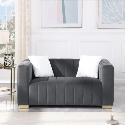 Luxurious 2-seat velvet sofa in grey color, side view