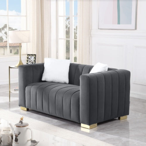 Luxurious 2-seat velvet sofa in grey color, side view