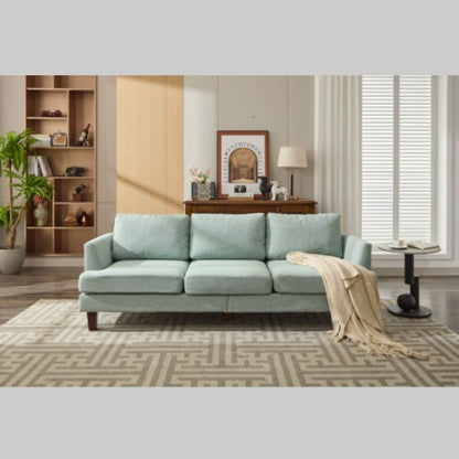 Light green 3-seater fabric sofa with USB ports in a cozy living room