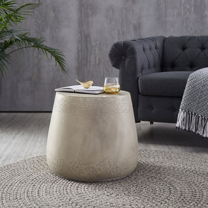 Orion Side Table, boho modern side table in light concrete, drum-shaped with light gray brushed finish.