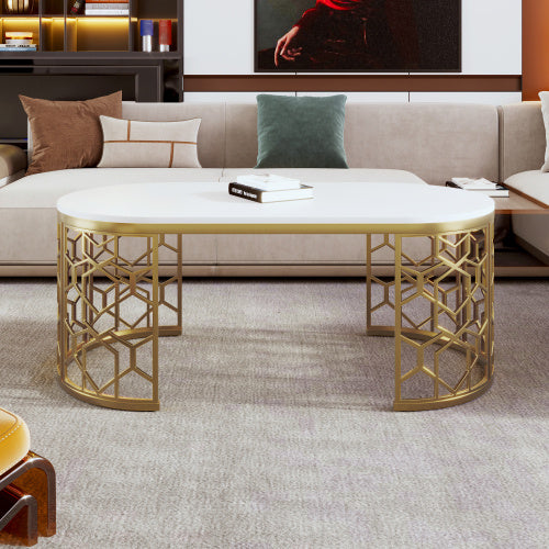 Elegant modern oval coffee table with gold stainless steel cut-out pattern frame and white MDF top.