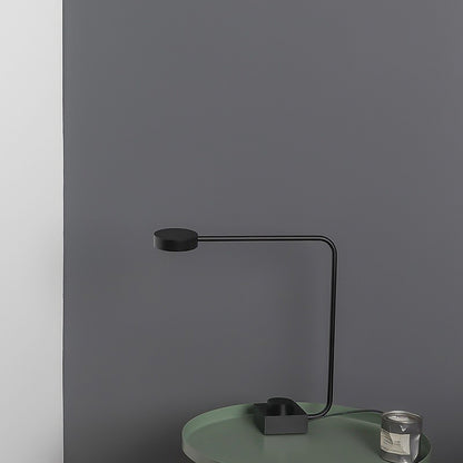 Sleek white LED bedside lamp with button switch