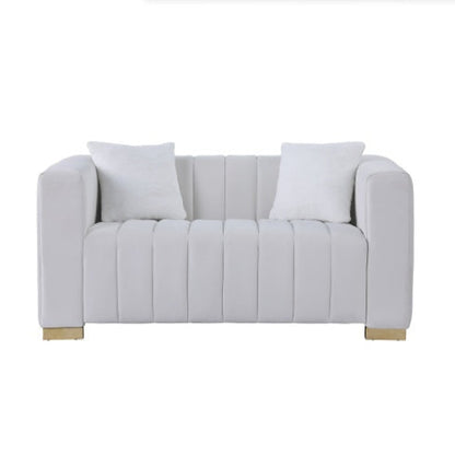 Luxurious 2-seat velvet sofa in white color, side view