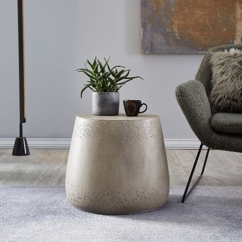 Orion Side Table, boho modern side table in light concrete, drum-shaped with light gray brushed finish.