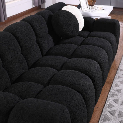 Black 3-seater boucle sofa, marshmallow cushions, premium foam seating, clean lines, luxury upholstery, comfortable seating, durable fabric sofa, modern living room sofa.