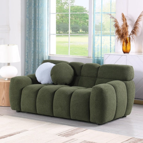 Elegant green bouclé 3-seater sofa with high-density foam cushions and two pillows for extra support. Perfect for adding style and comfort to any room.