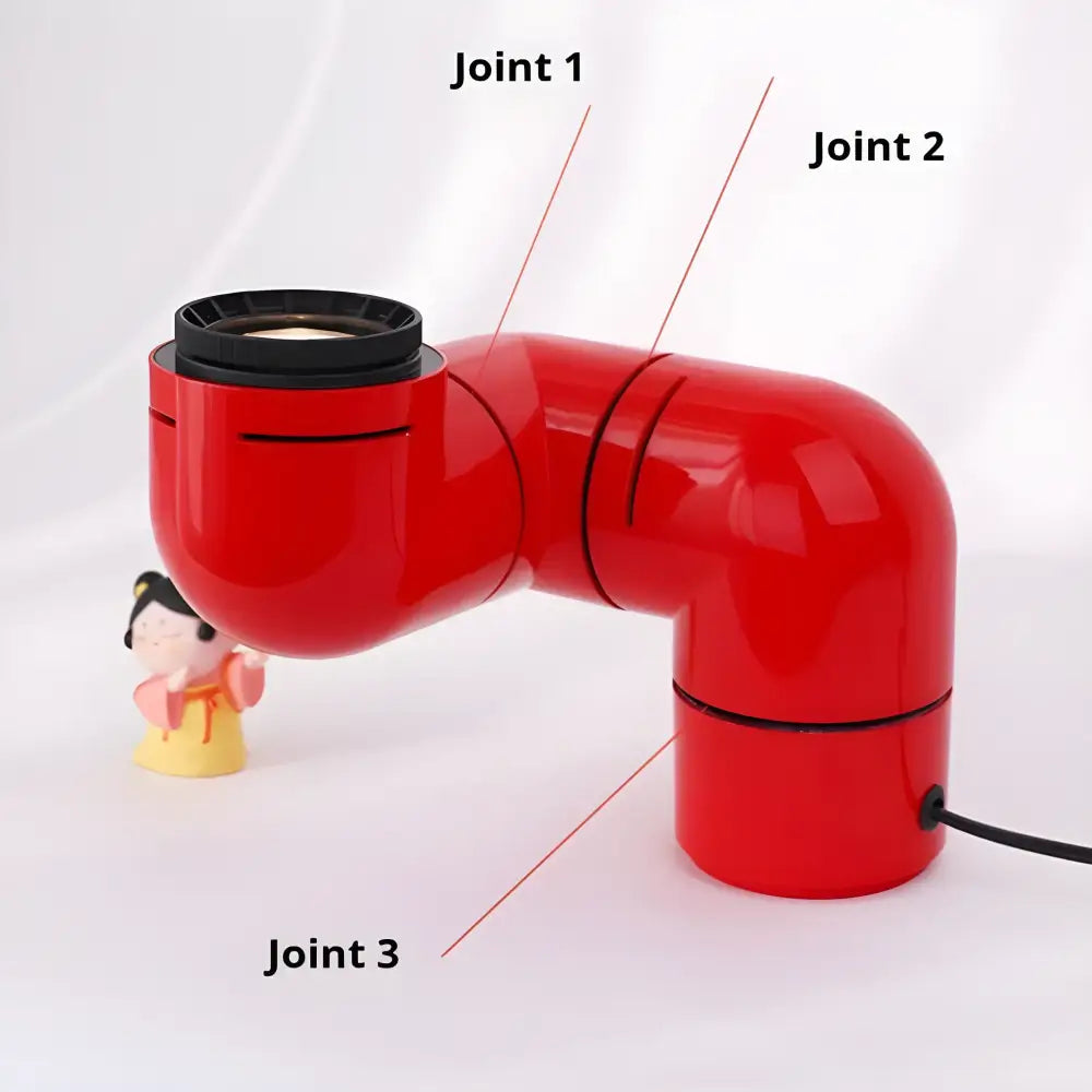 Close-up of the Space Age Creative Water Pipe Lamp in red, highlighting the joints and design elements.